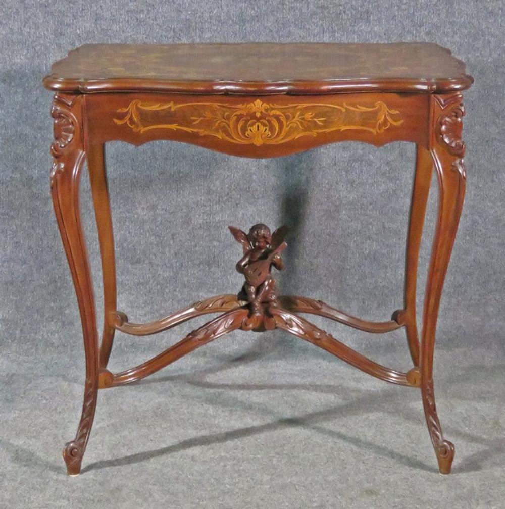 Carved French Louis XV Puttu Cherub Inlaid Center Hall Table Attr. RJ Horner