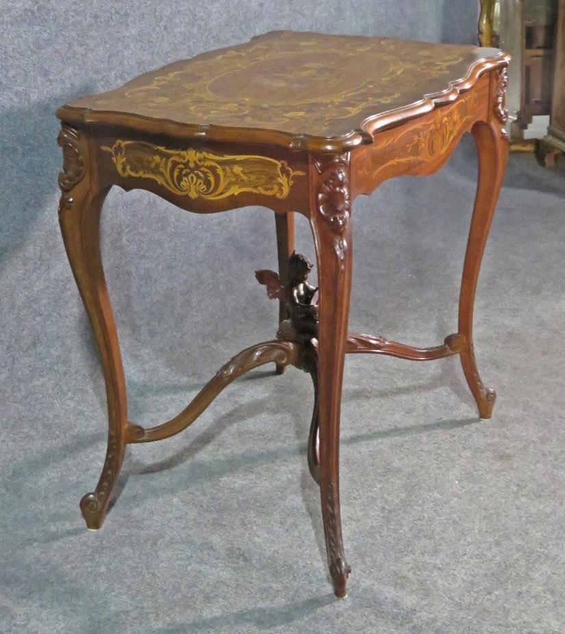 Carved French Louis XV Puttu Cherub Inlaid Center Hall Table Attr. RJ Horner