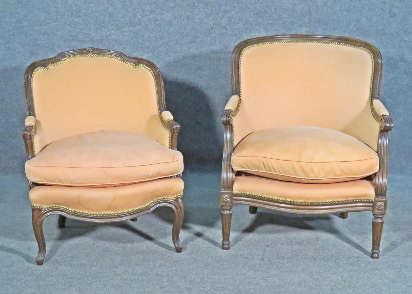 Mated Pair Similarly Upholstered French Carved Walnut Louis Bergere Chairs