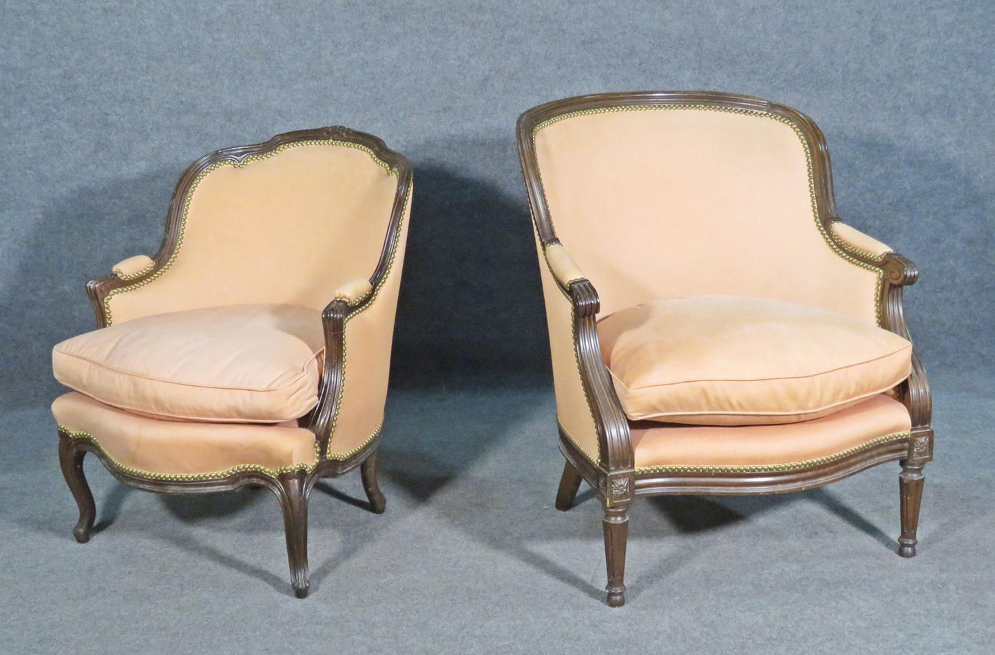 Mated Pair Similarly Upholstered French Carved Walnut Louis Bergere Chairs