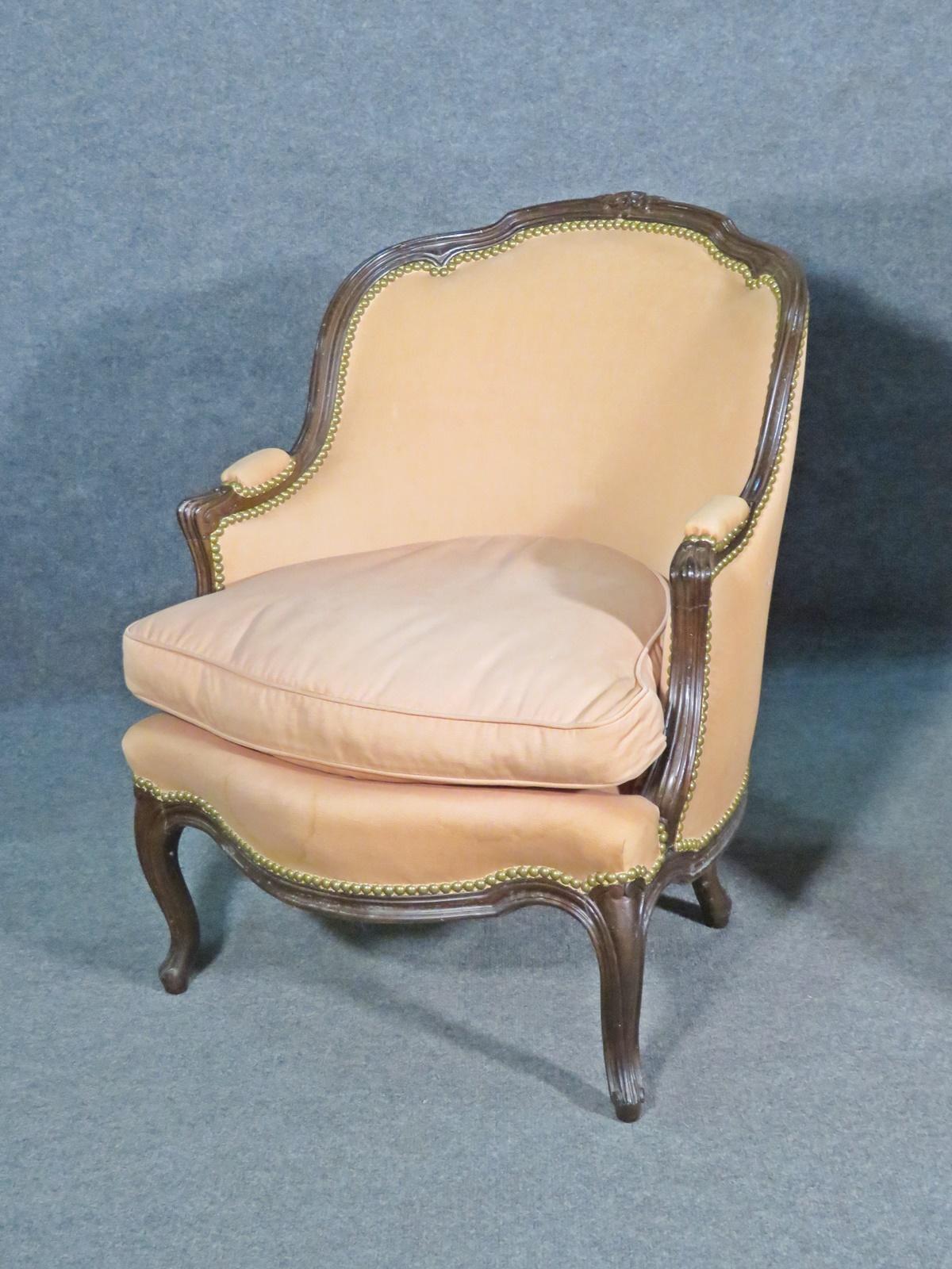 Mated Pair Similarly Upholstered French Carved Walnut Louis Bergere Chairs