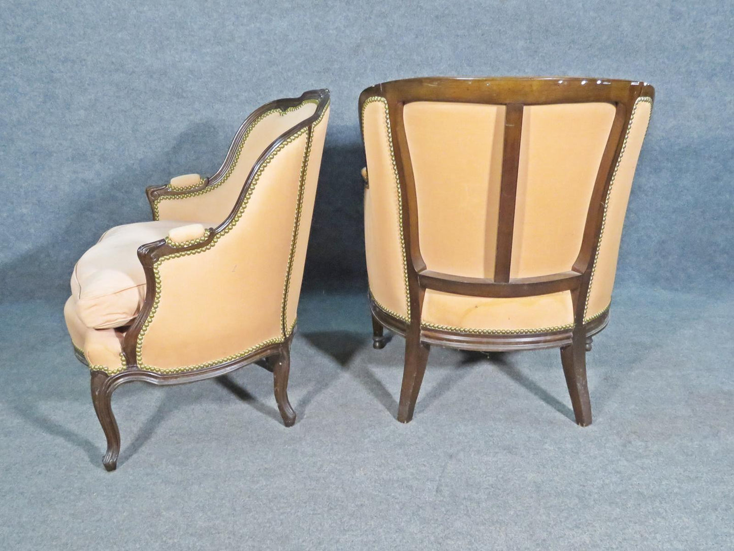 Mated Pair Similarly Upholstered French Carved Walnut Louis Bergere Chairs