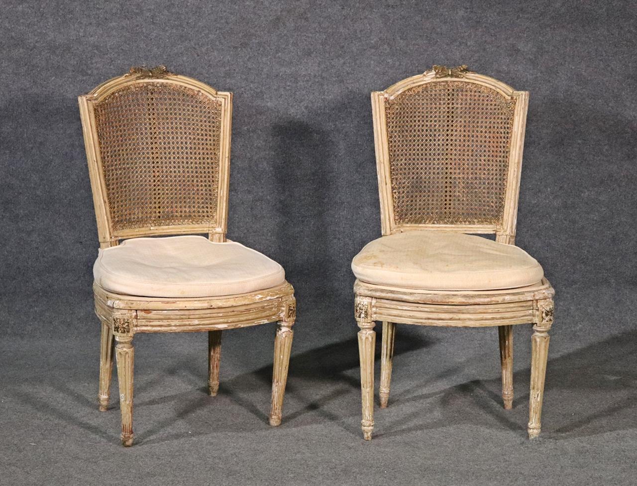 Pair of Antique Paint Decorated Cane Back French Louis XVI Chairs, Circa 1860s