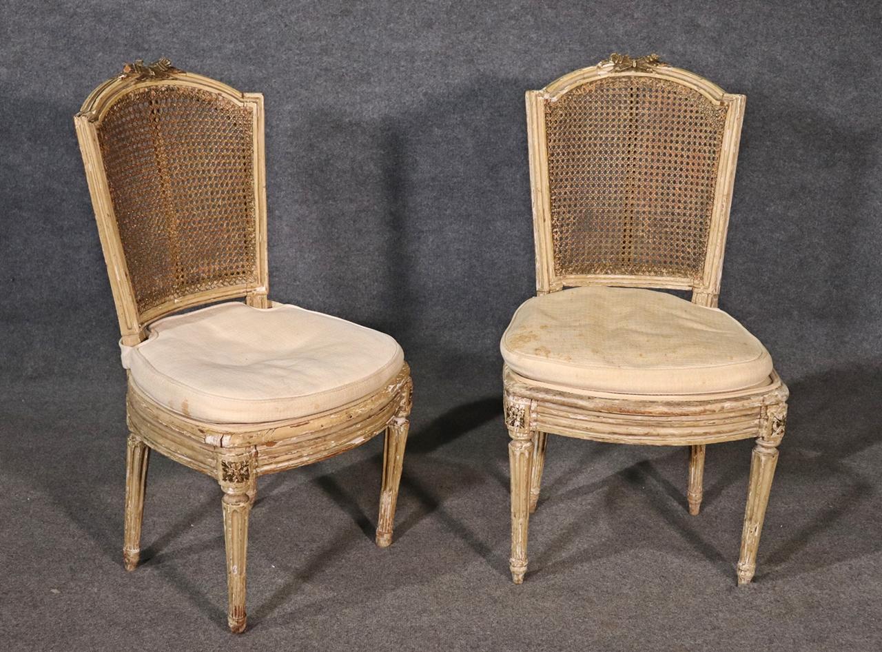 Pair of Antique Paint Decorated Cane Back French Louis XVI Chairs, Circa 1860s