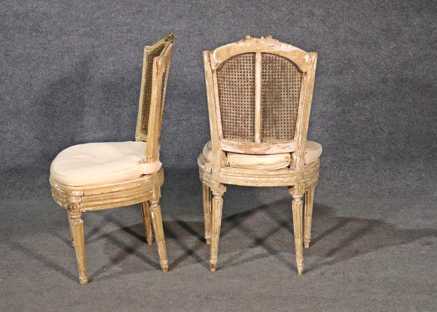 Pair of Antique Paint Decorated Cane Back French Louis XVI Chairs, Circa 1860s