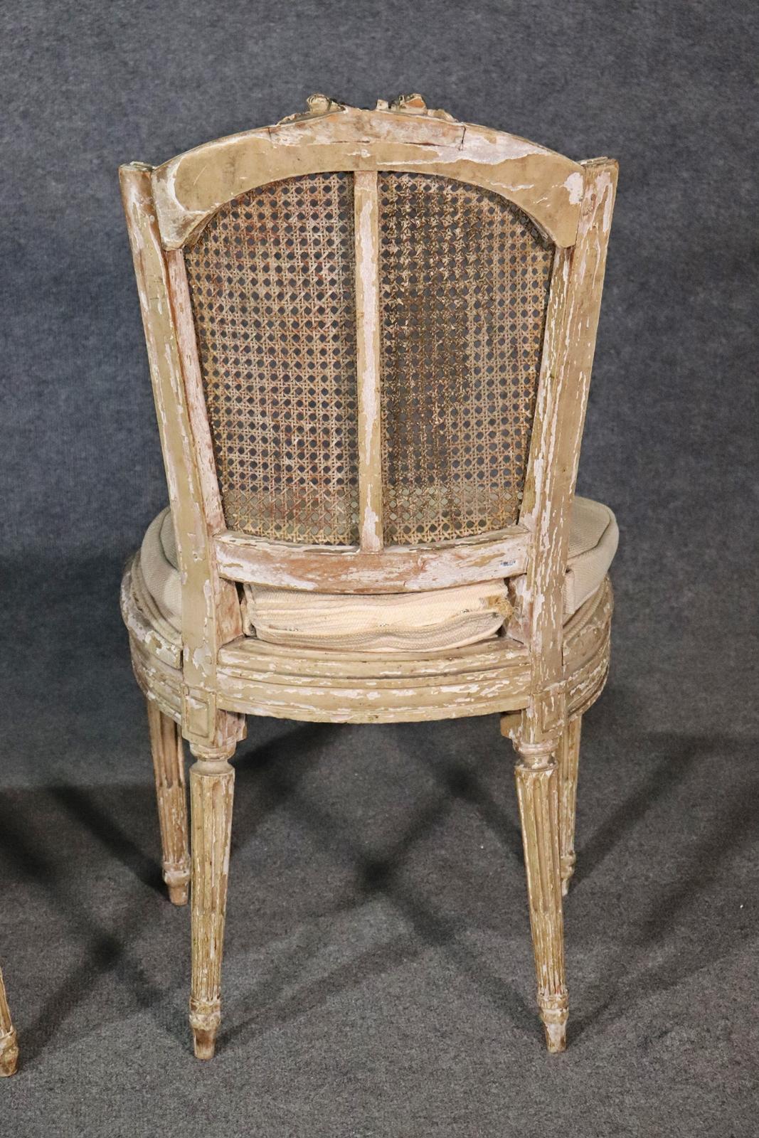 Pair of Antique Paint Decorated Cane Back French Louis XVI Chairs, Circa 1860s