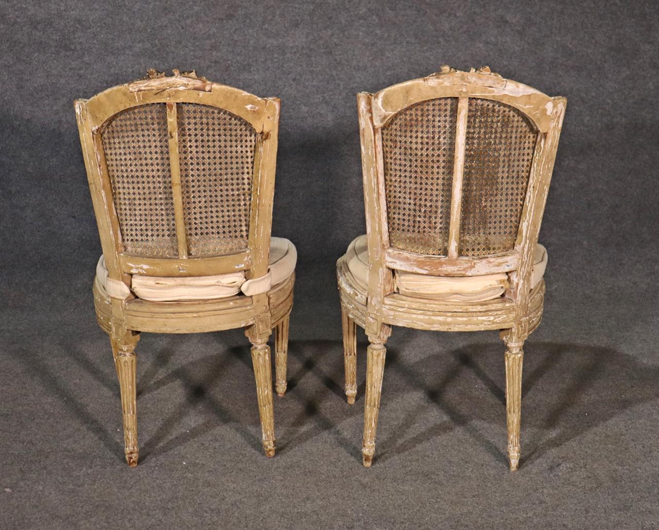 Pair of Antique Paint Decorated Cane Back French Louis XVI Chairs, Circa 1860s