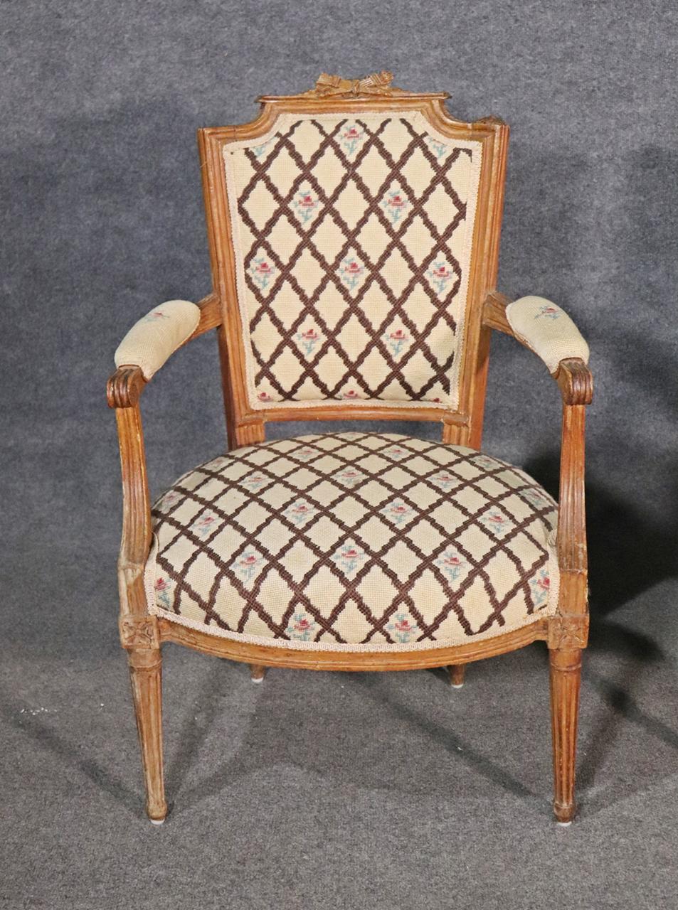 Companion Pair of Nearly Identical French Louis XVI Armchairs, Circa 1900