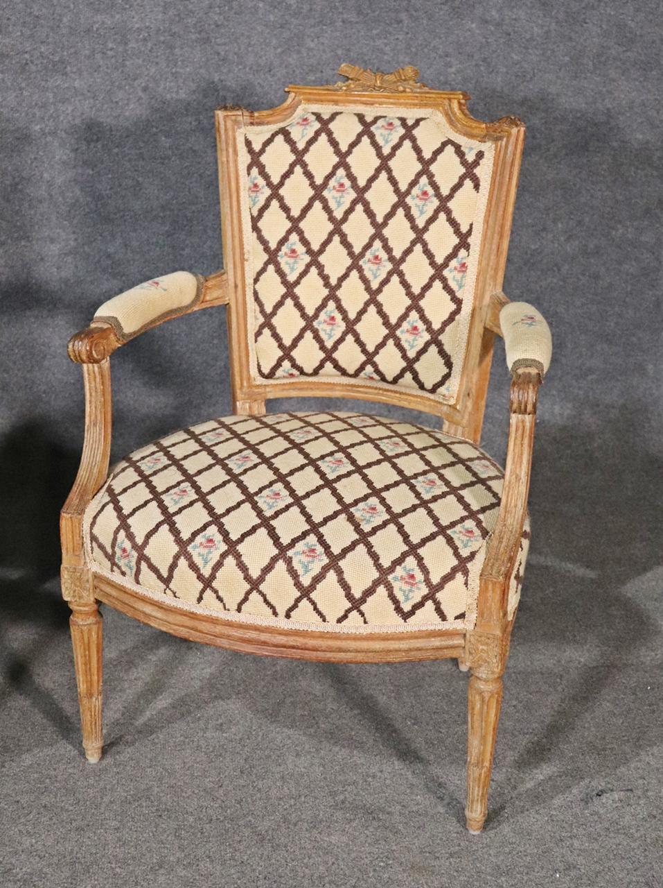 Companion Pair of Nearly Identical French Louis XVI Armchairs, Circa 1900