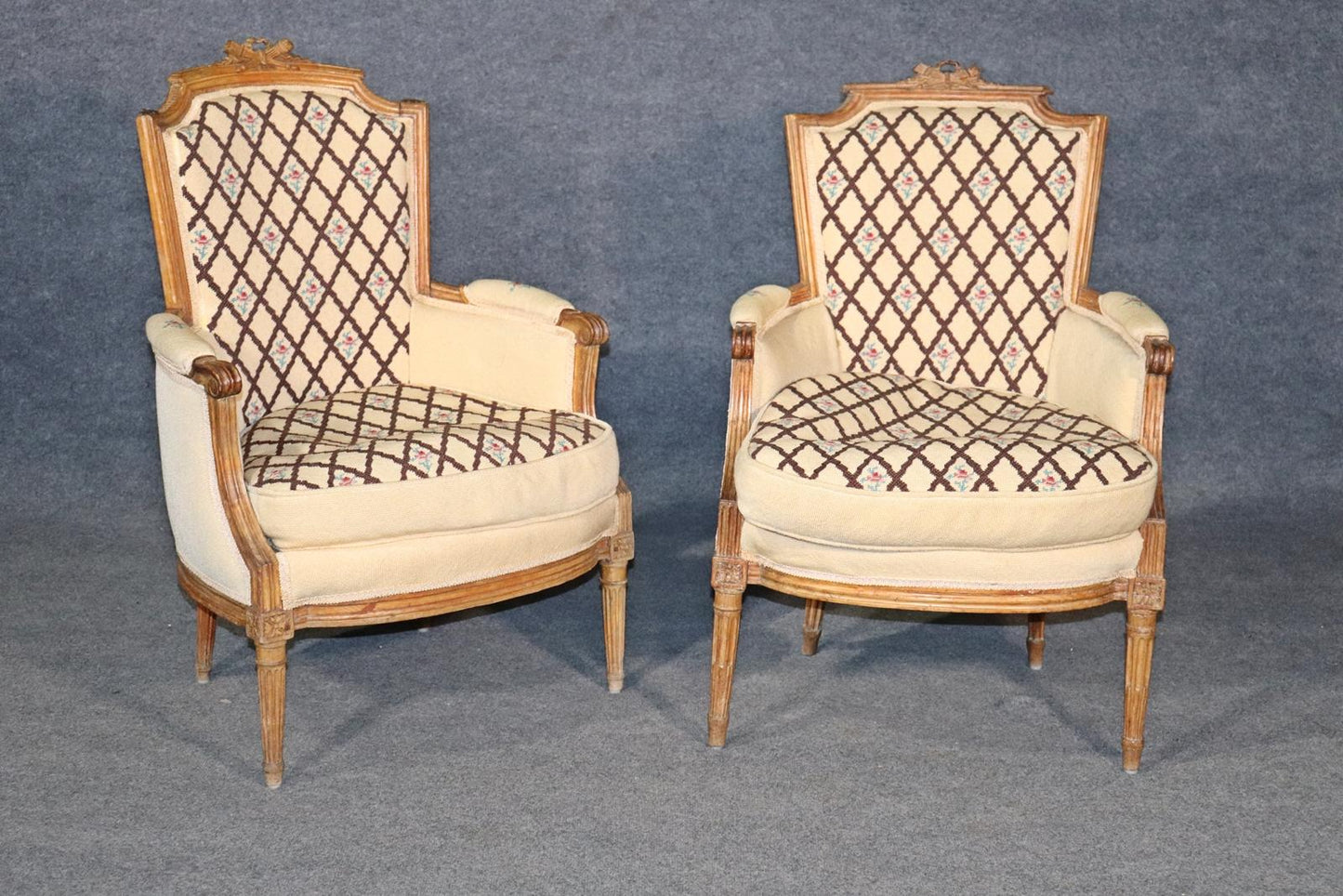 Companion Pair of Nearly Identical French Louis XVI Armchairs, Circa 1900