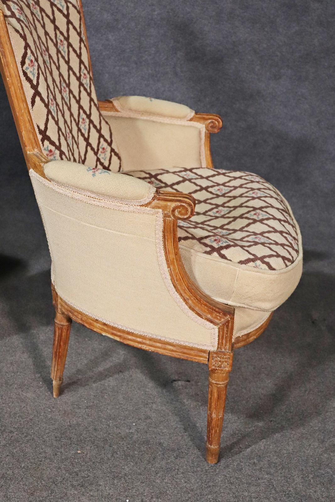 Companion Pair of Nearly Identical French Louis XVI Armchairs, Circa 1900