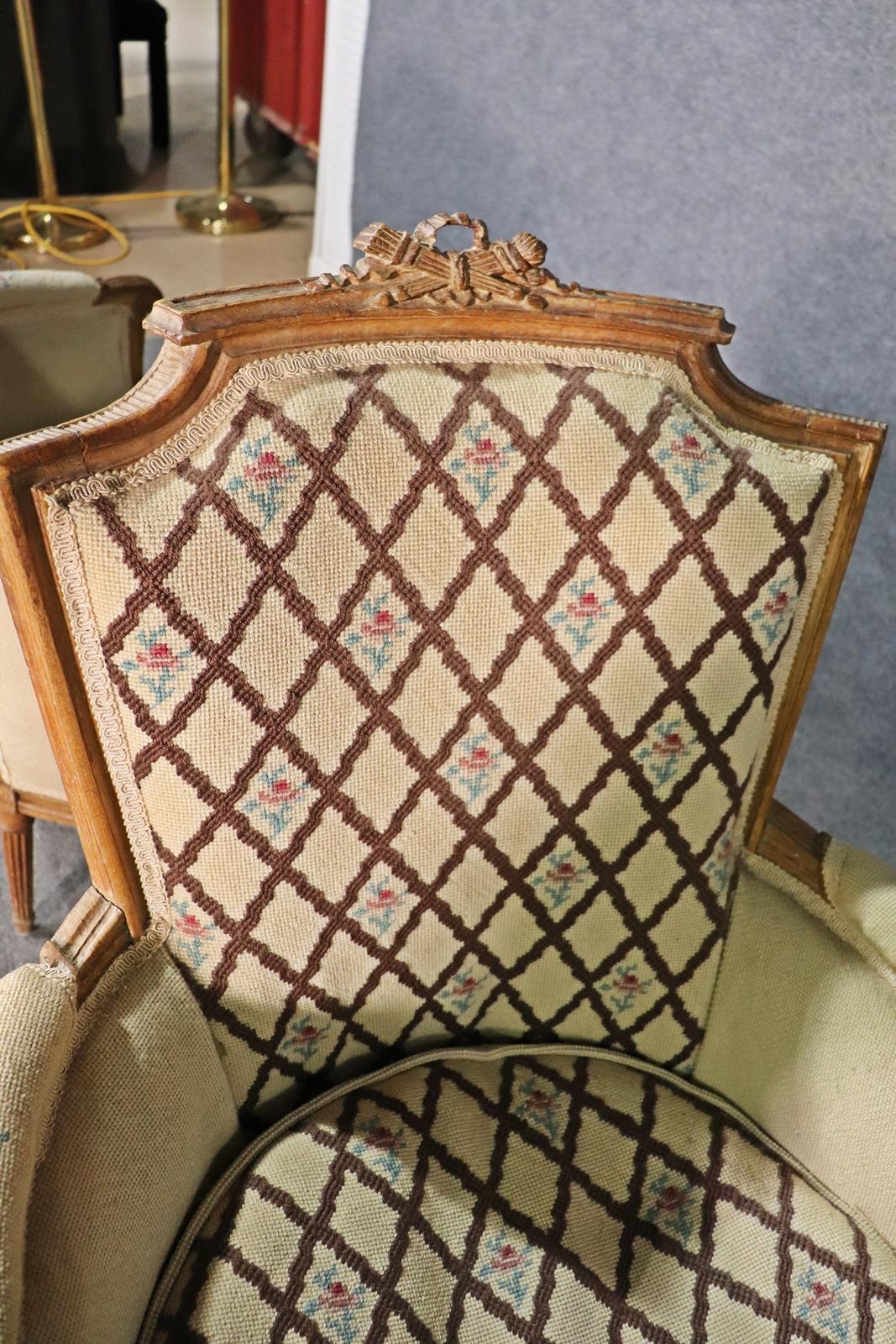 Companion Pair of Nearly Identical French Louis XVI Armchairs, Circa 1900