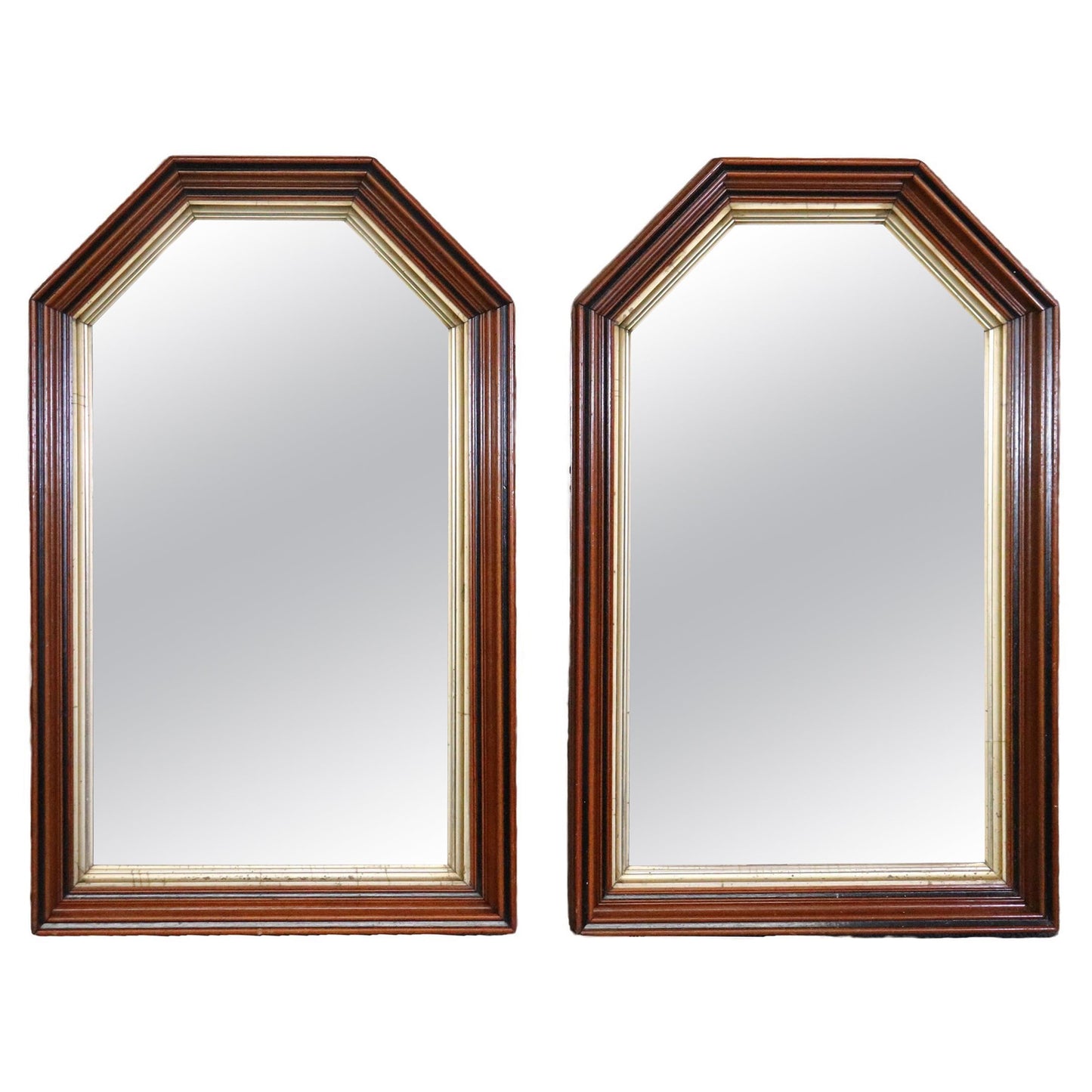 Pair of Highly Molded Walnut Geometric Pseudo Gothic Style Gilded Wall Mirrors