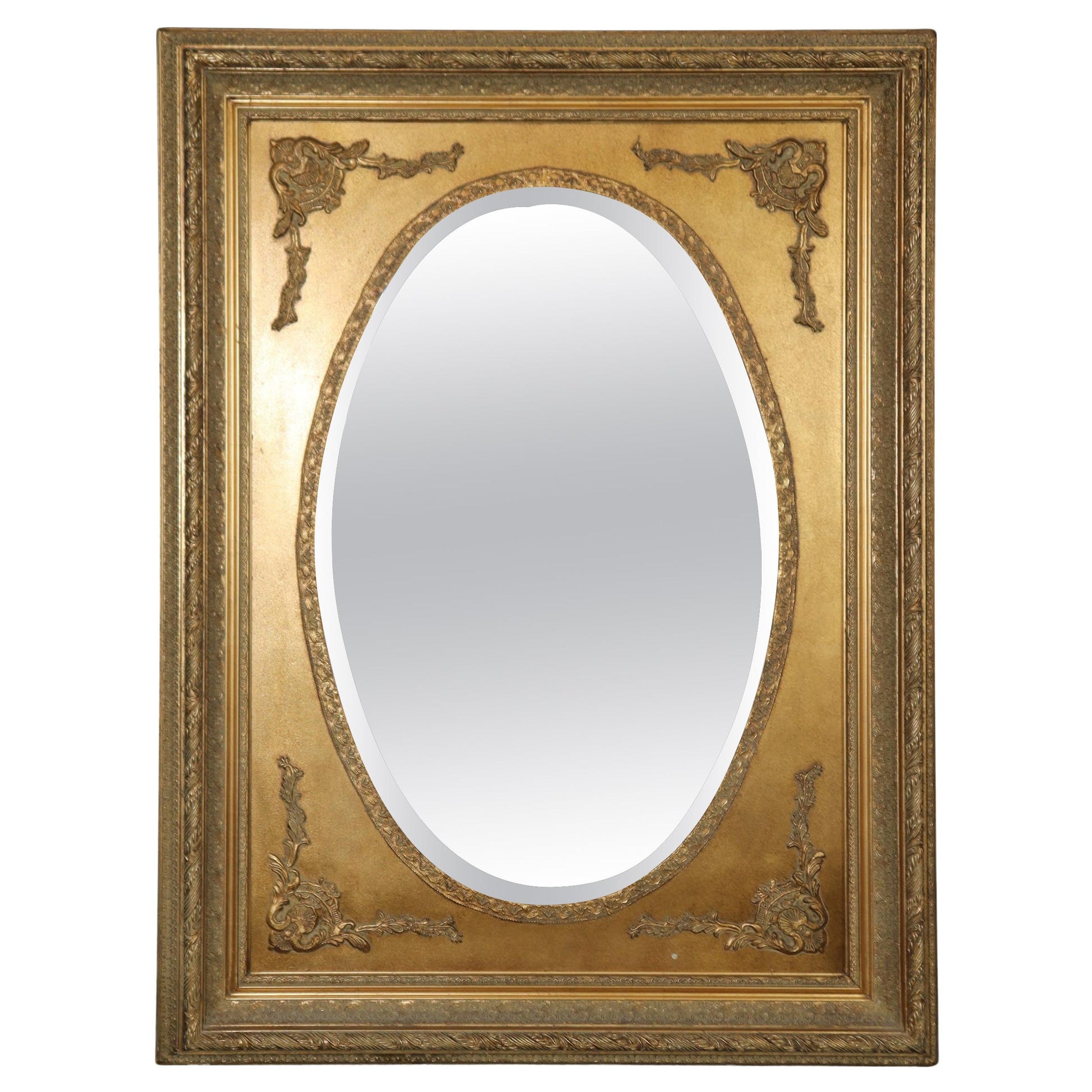 Fine Quality Carved Late Victorian Era Gilded Beveled Oval in Rectangle Mirror