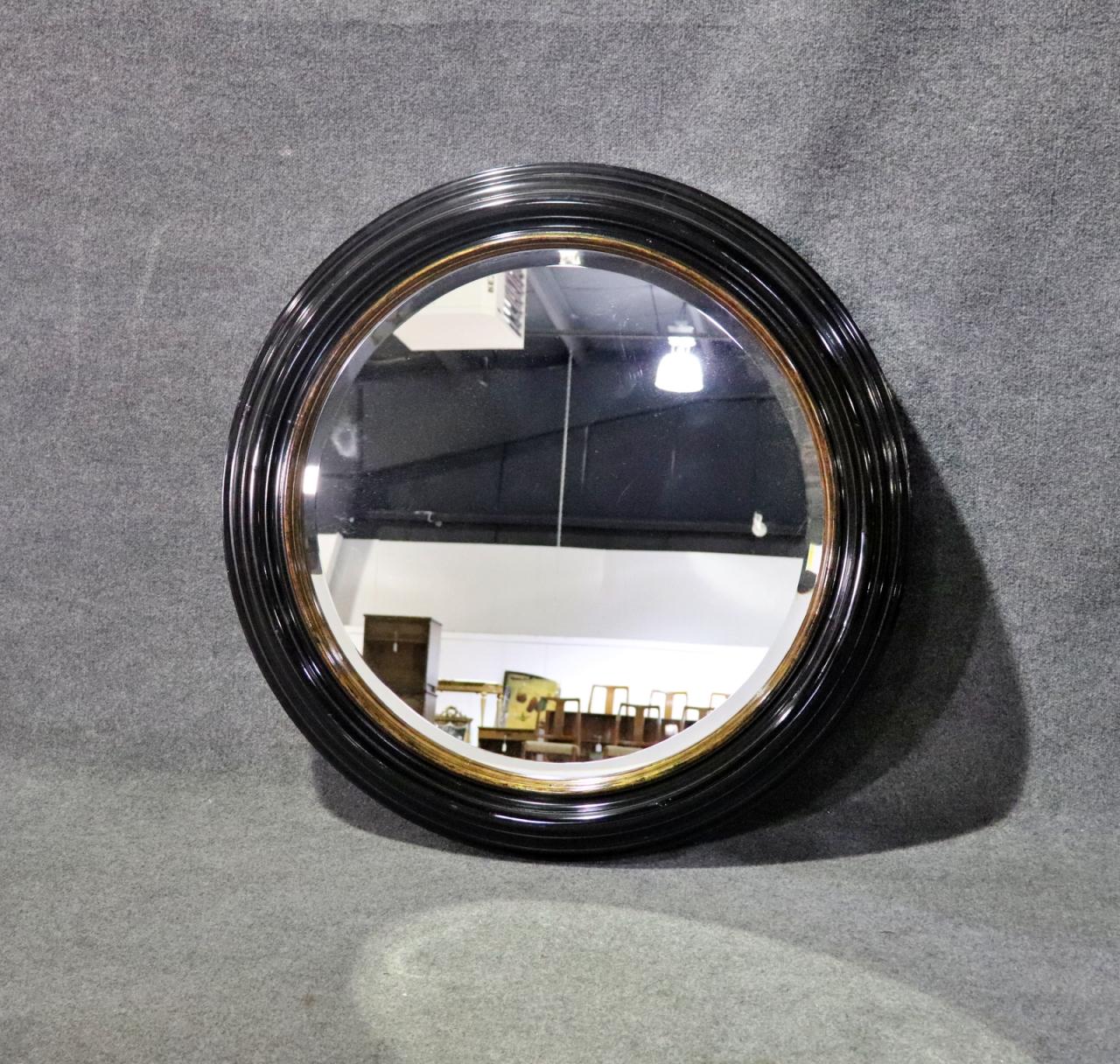 Great Milling Road by Baker Large Ebonized Circular Gilded Wall Mirror