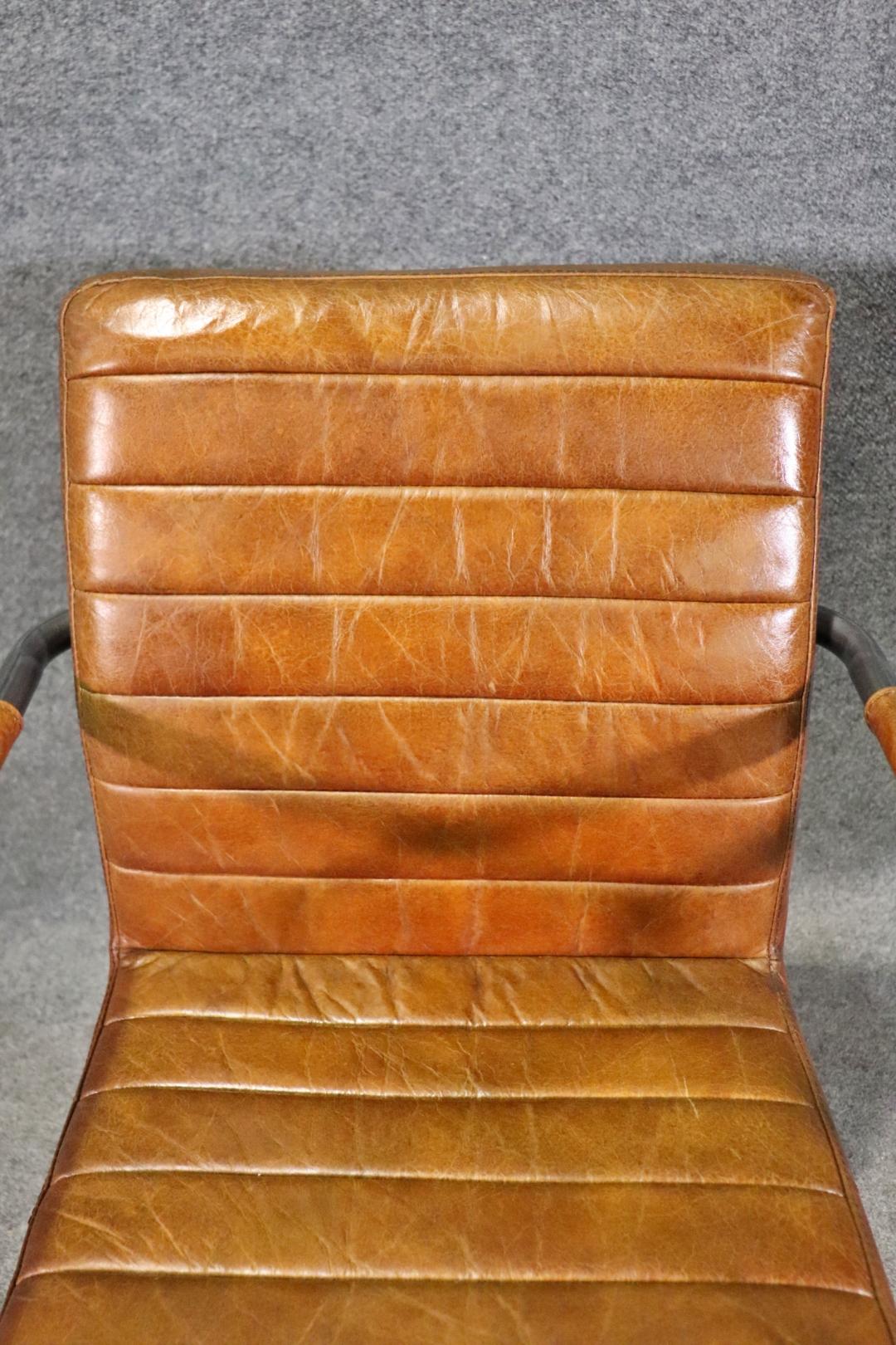 Pair of Leather Upholstered Mid Century Modern Black Frames Armchairs