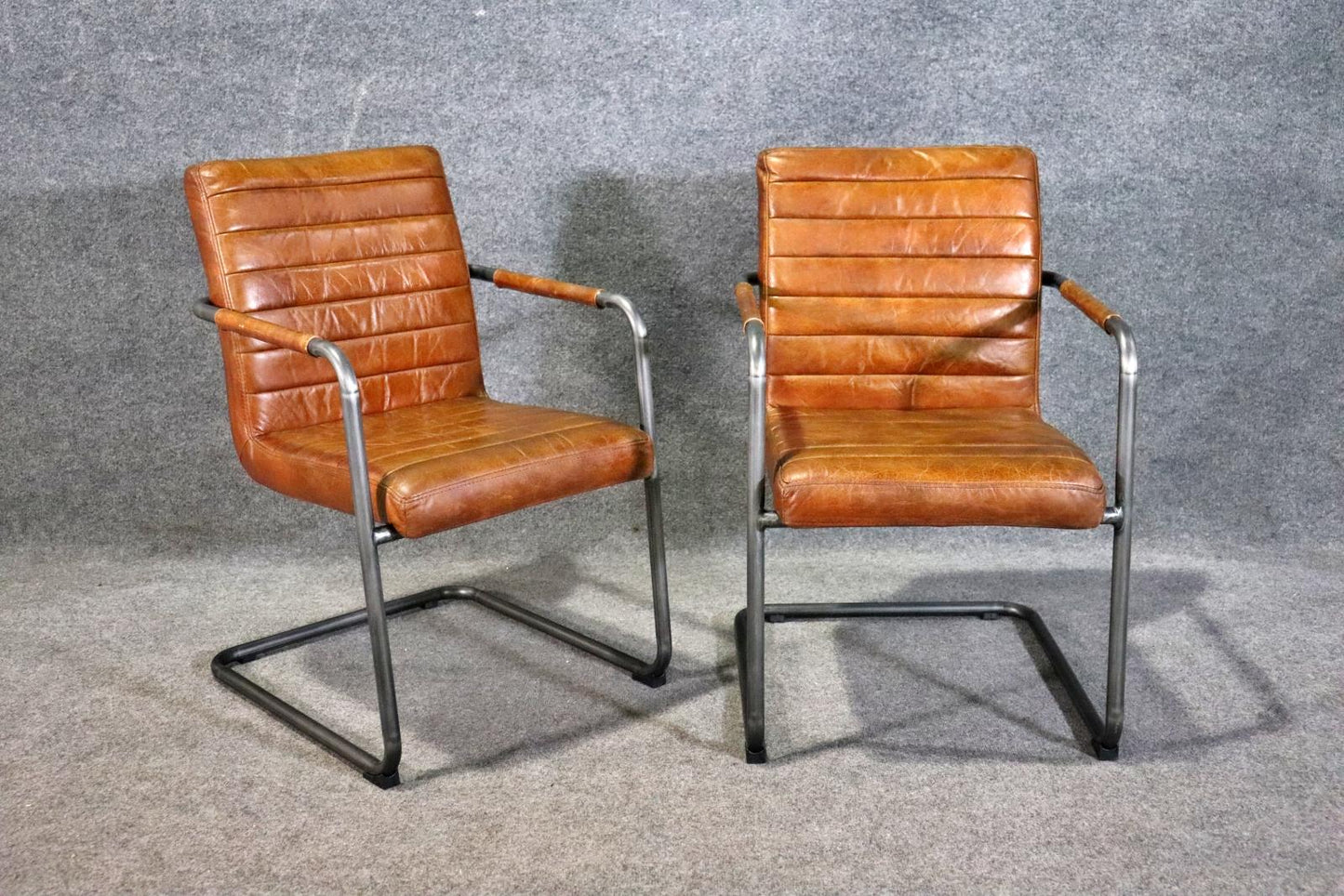 Pair of Leather Upholstered Mid Century Modern Black Frames Armchairs