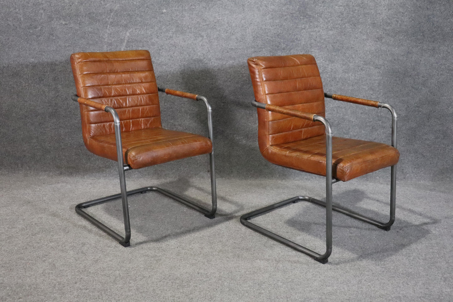 Pair of Leather Upholstered Mid Century Modern Black Frames Armchairs