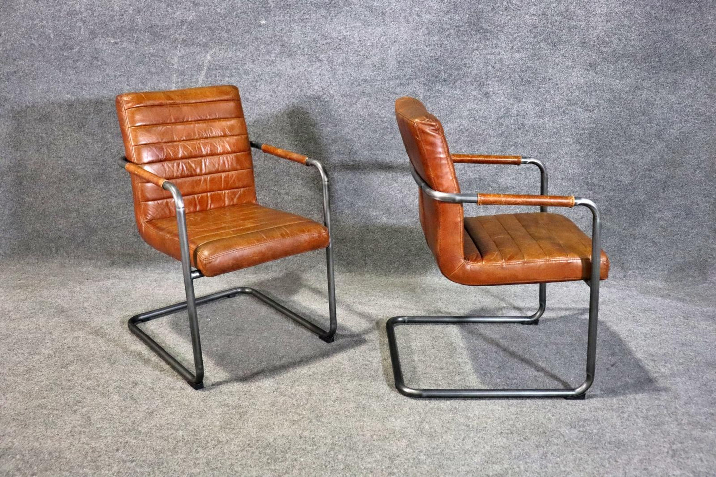 Pair of Leather Upholstered Mid Century Modern Black Frames Armchairs