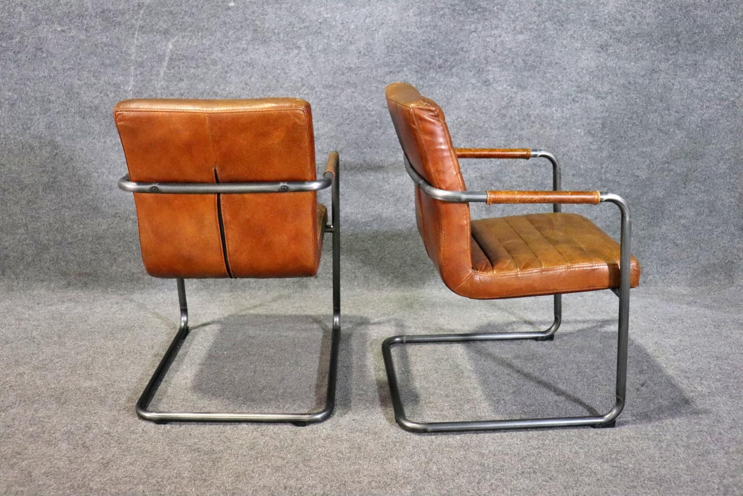 Pair of Leather Upholstered Mid Century Modern Black Frames Armchairs