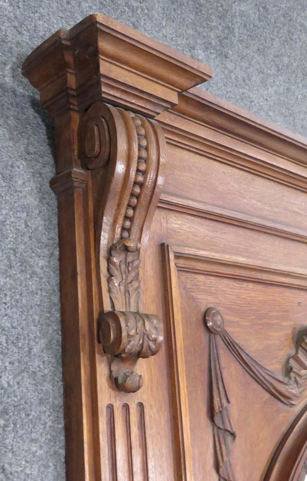 French Carved Walnut Tall Trumeau Mirror with Plaster Cherub Plaque, circa 1860s