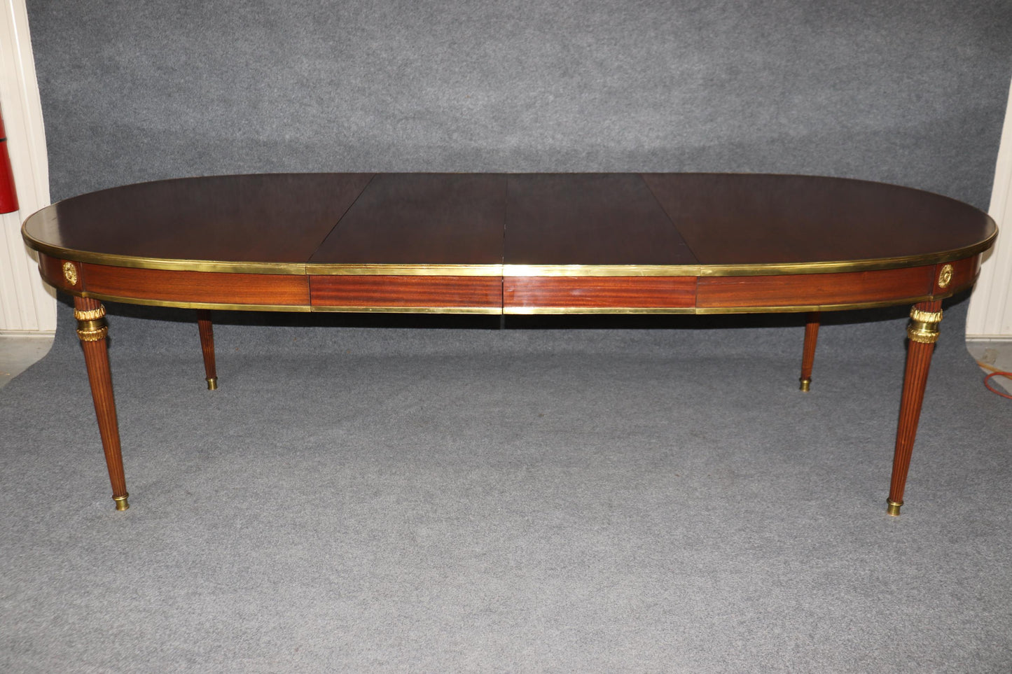 Rare Bronze Mounted Signed Maison Jansen Ribbon Mahogany Dining Table