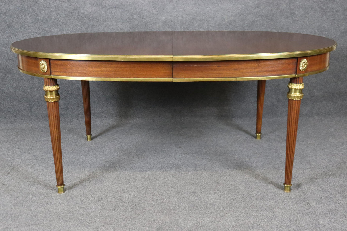 Rare Bronze Mounted Signed Maison Jansen Ribbon Mahogany Dining Table