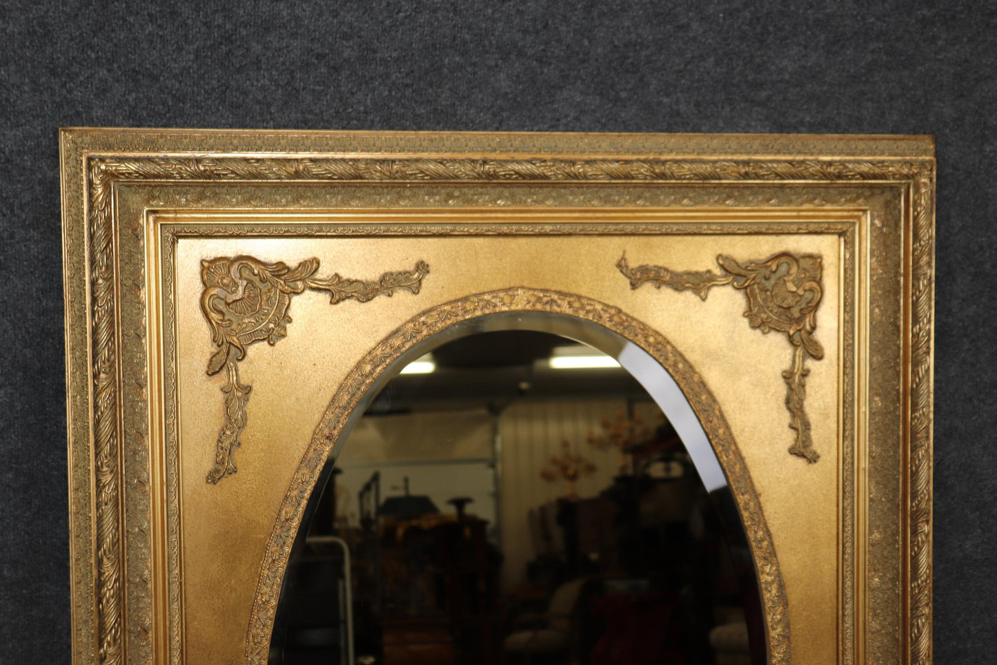 Fine Quality Carved Late Victorian Era Gilded Beveled Oval in Rectangle Mirror