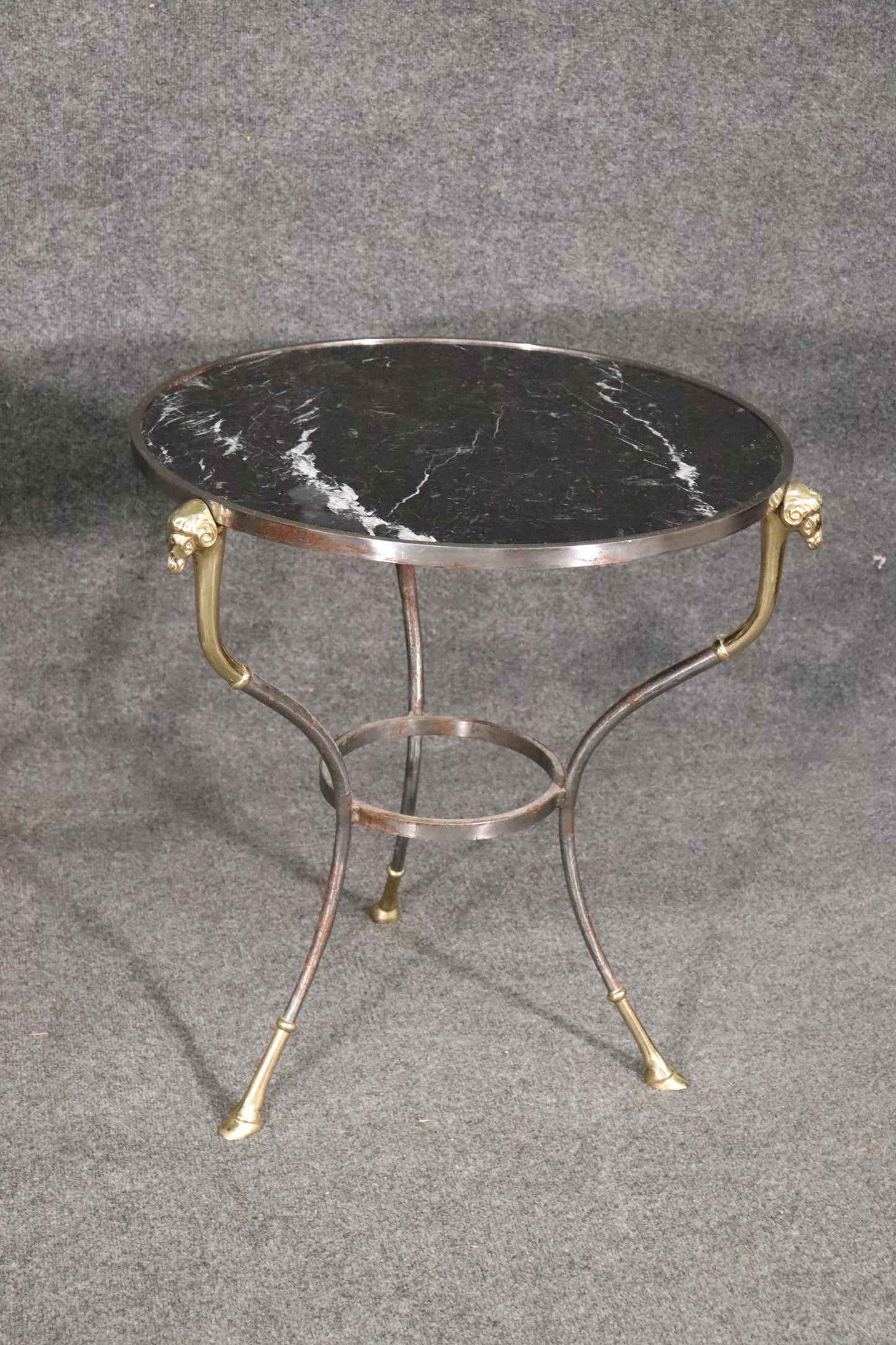 Pair French Louis XV Black Marble Steel and Brass Rams Head Gueridons End Tables