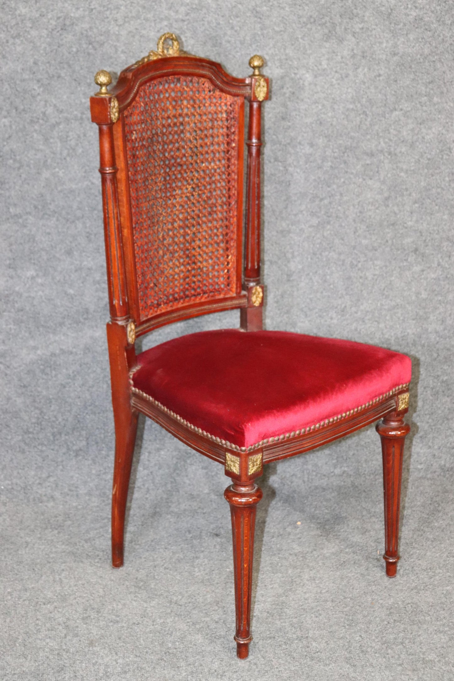 Set of 8 French Louis XVI Style Mahogany Cane Back Dining Chairs with Ormolu