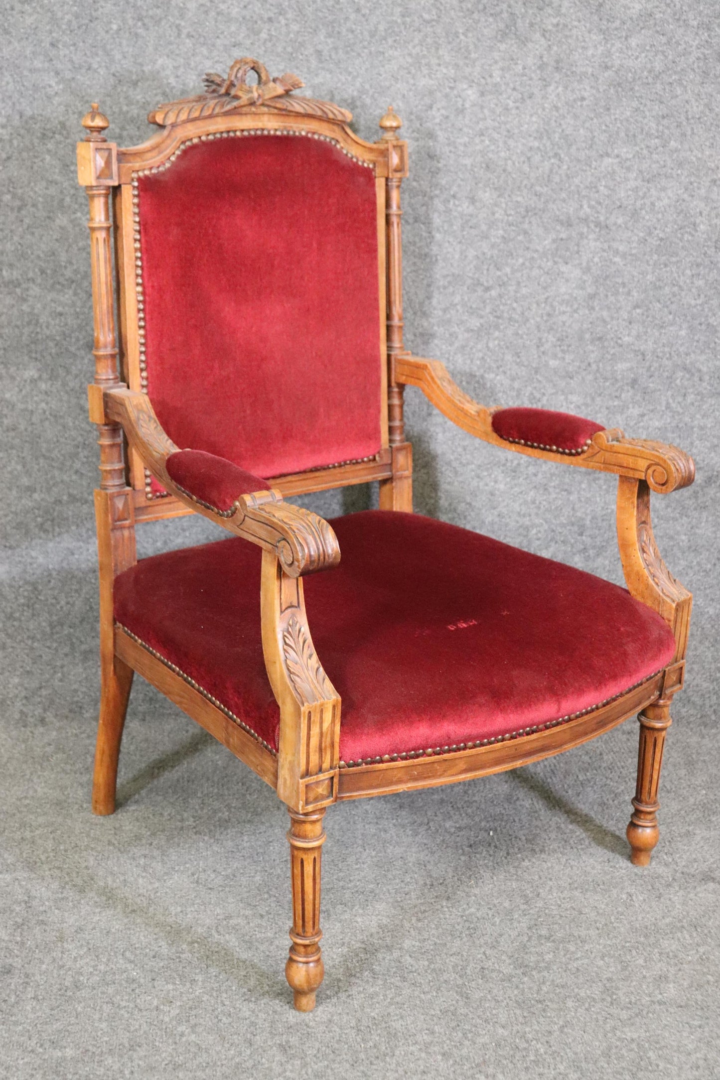 Pair of Carved Walnut Burgundy Velvet Louis XVI Fauteuil Armchairs, circa 1920