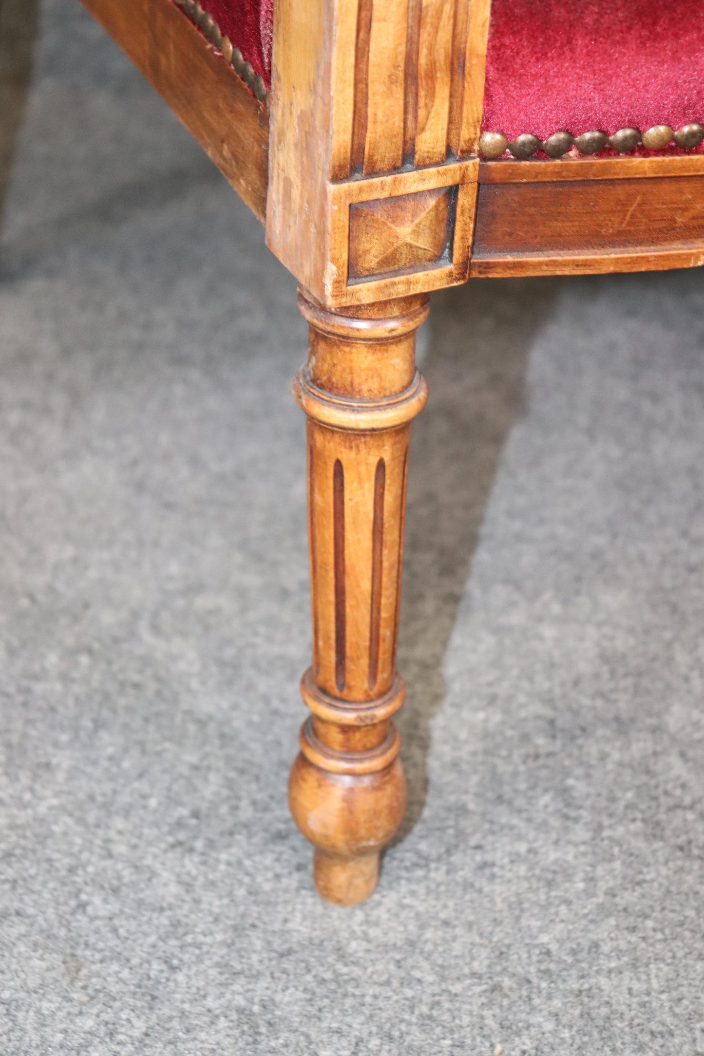 Pair of Carved Walnut Burgundy Velvet Louis XVI Fauteuil Armchairs, circa 1920