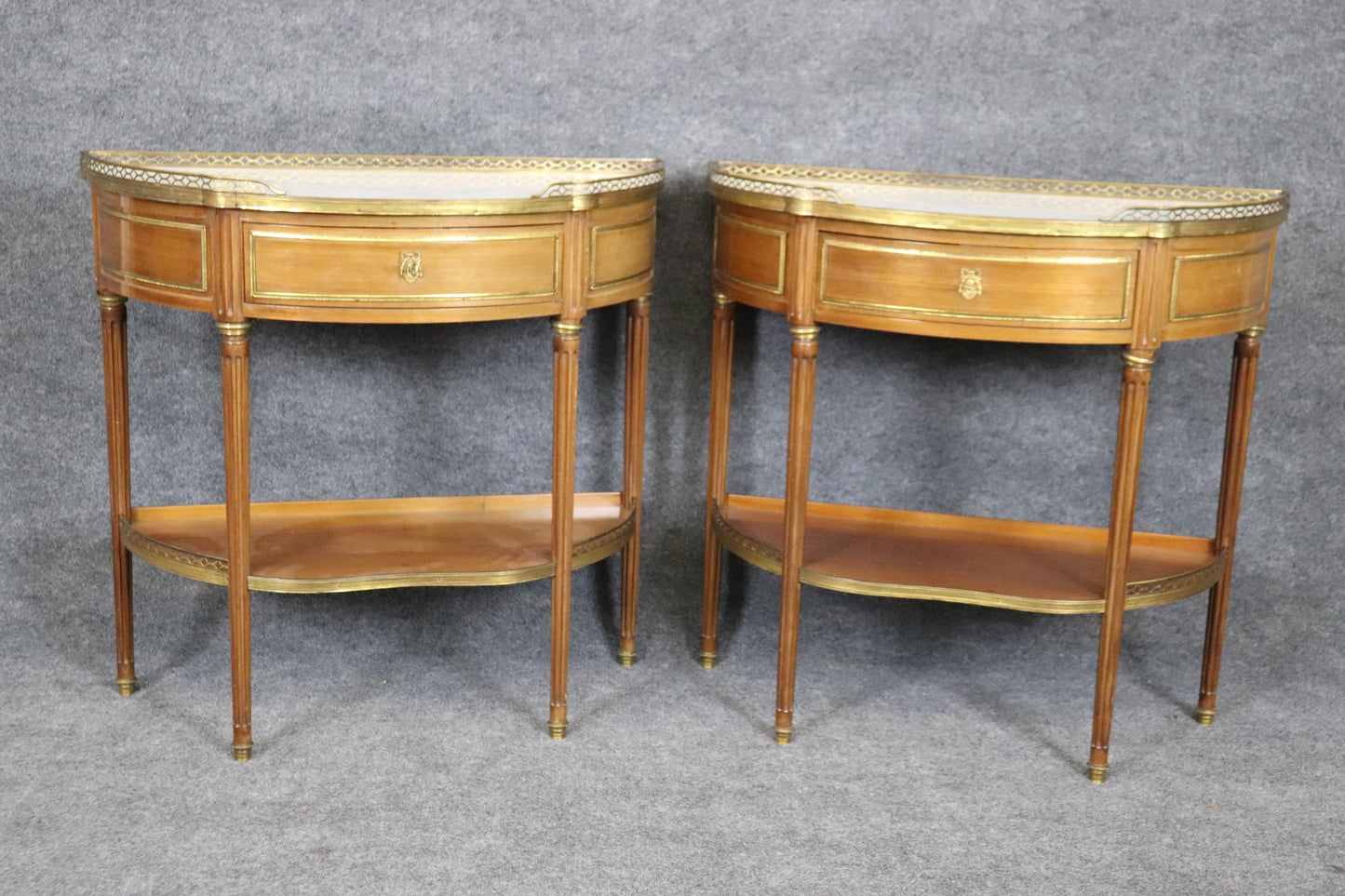 Superb Pair of Marble Top Bronze Mounted French Demilune Console Tables