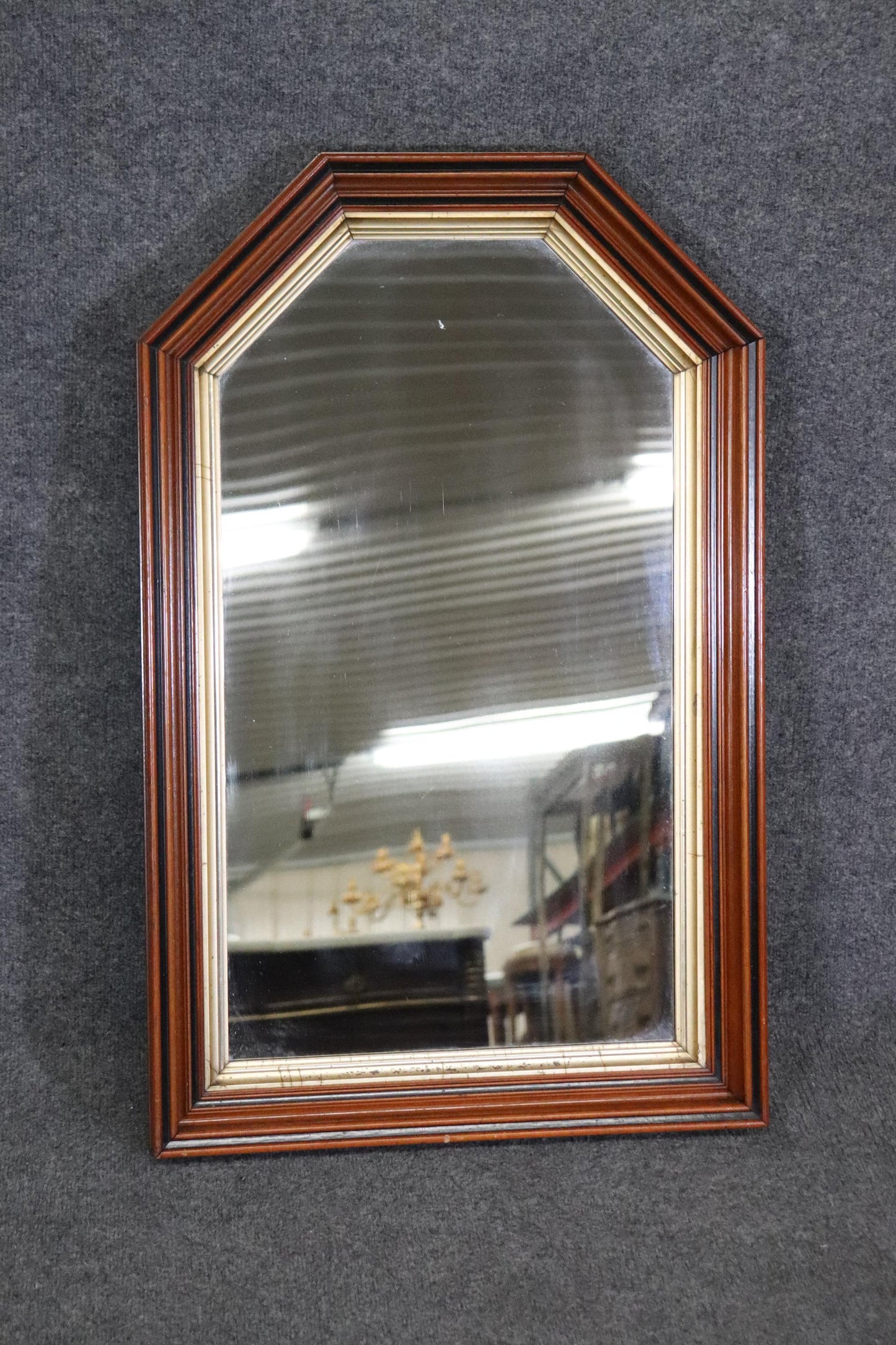 Pair of Highly Molded Walnut Geometric Pseudo Gothic Style Gilded Wall Mirrors