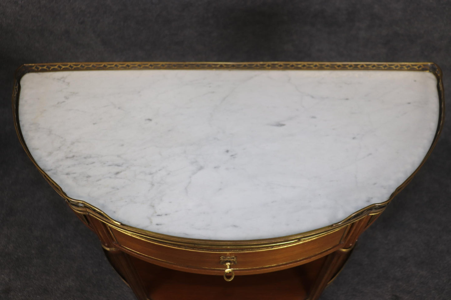 Superb Pair of Marble Top Bronze Mounted French Demilune Console Tables