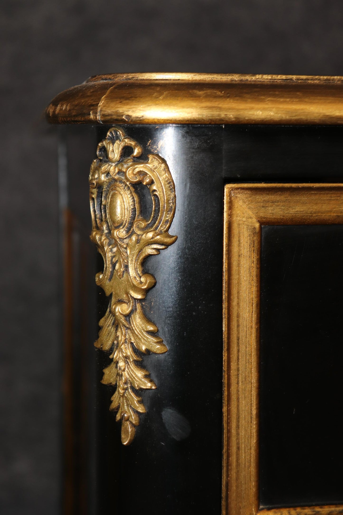 Matched Pair of Maison Jansen style Ebonized and Gilded Louis XV Commodes