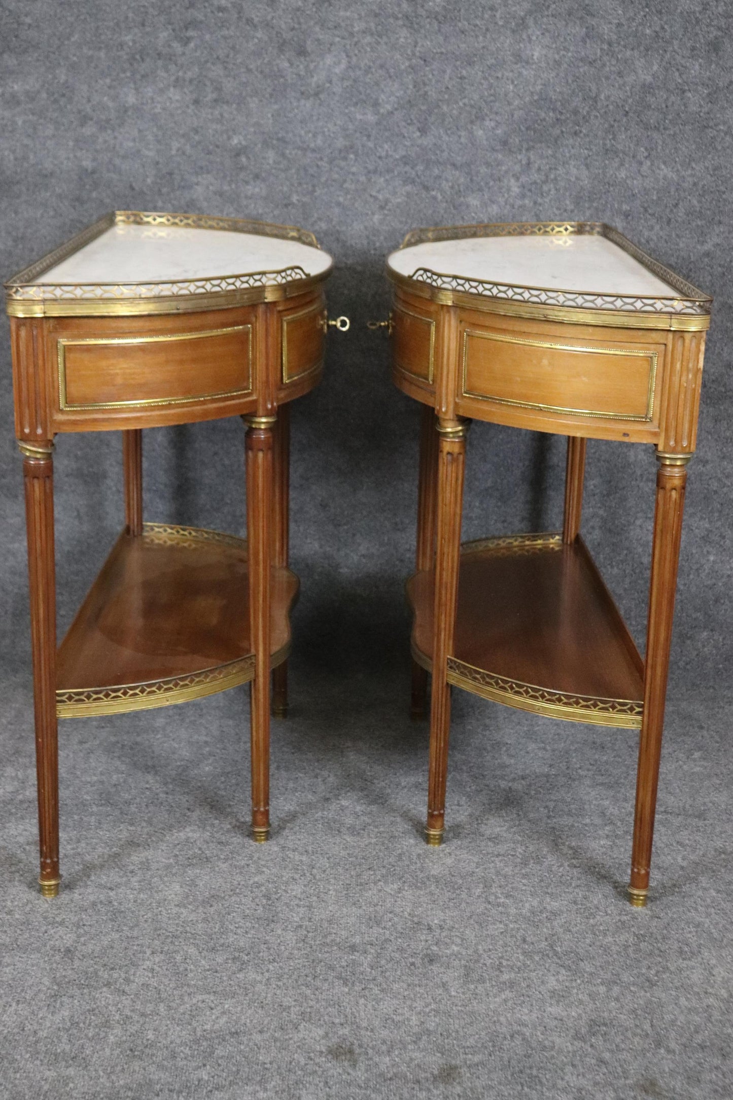 Superb Pair of Marble Top Bronze Mounted French Demilune Console Tables