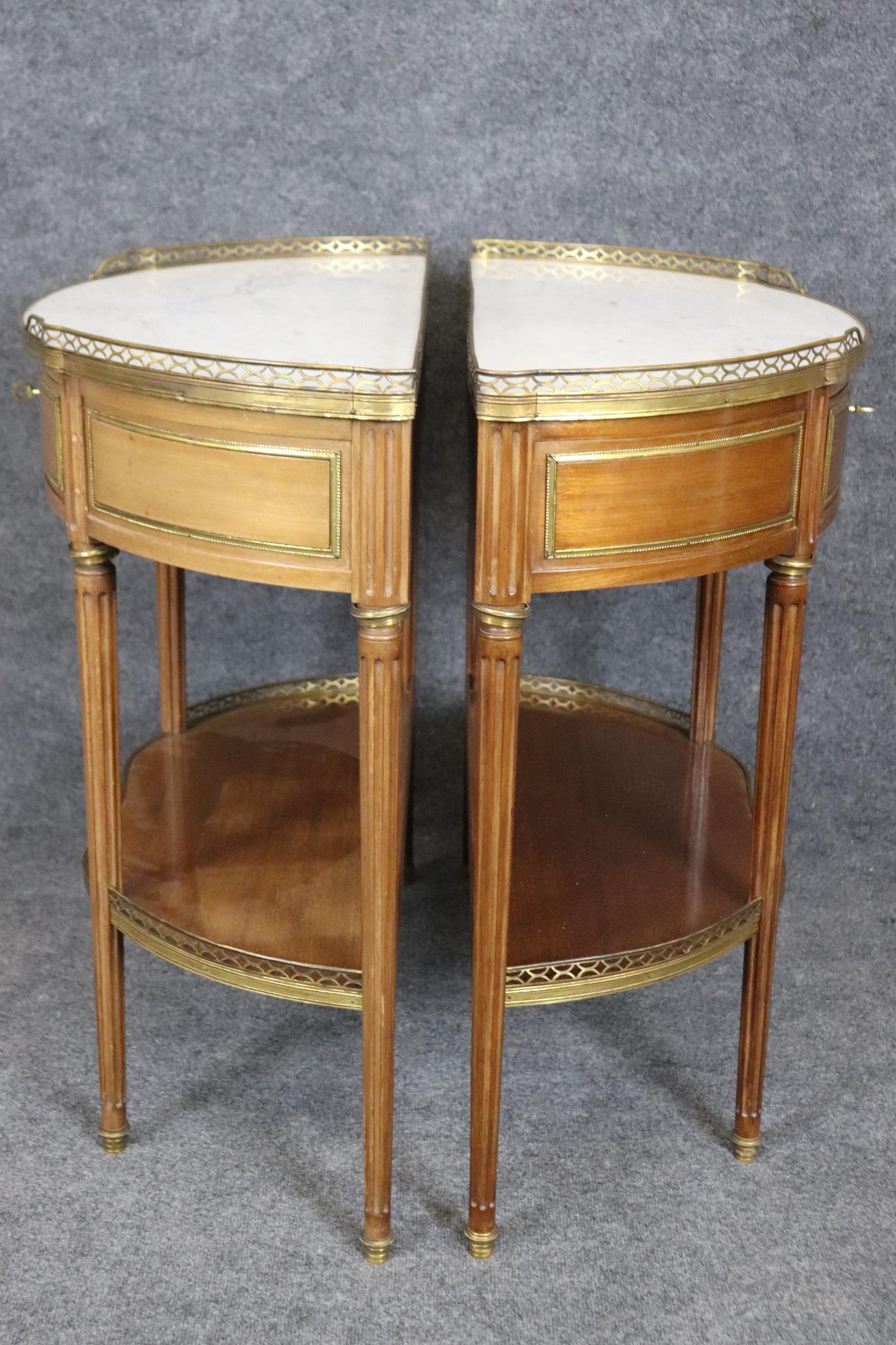 Superb Pair of Marble Top Bronze Mounted French Demilune Console Tables