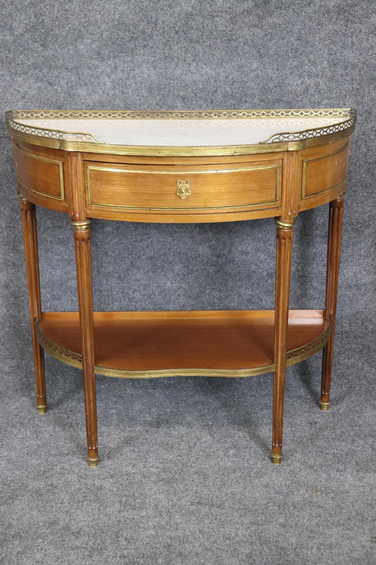 Superb Pair of Marble Top Bronze Mounted French Demilune Console Tables