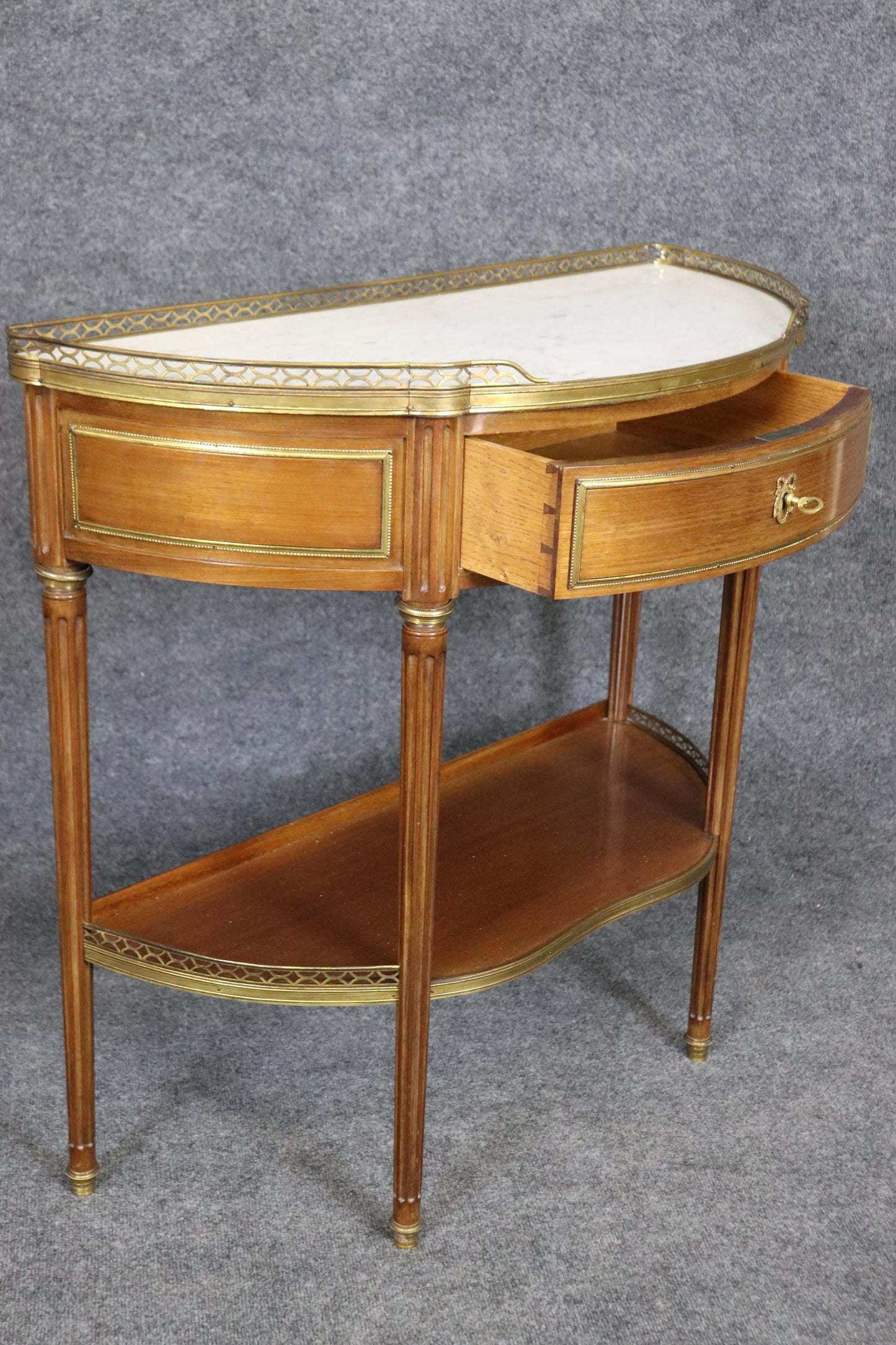 Superb Pair of Marble Top Bronze Mounted French Demilune Console Tables