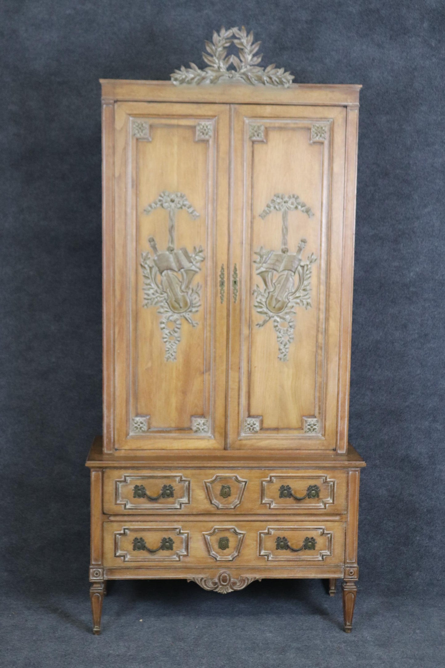 Superb Carved French Auffray Style Louis XVI Limed Walnut Armoire with Wreath