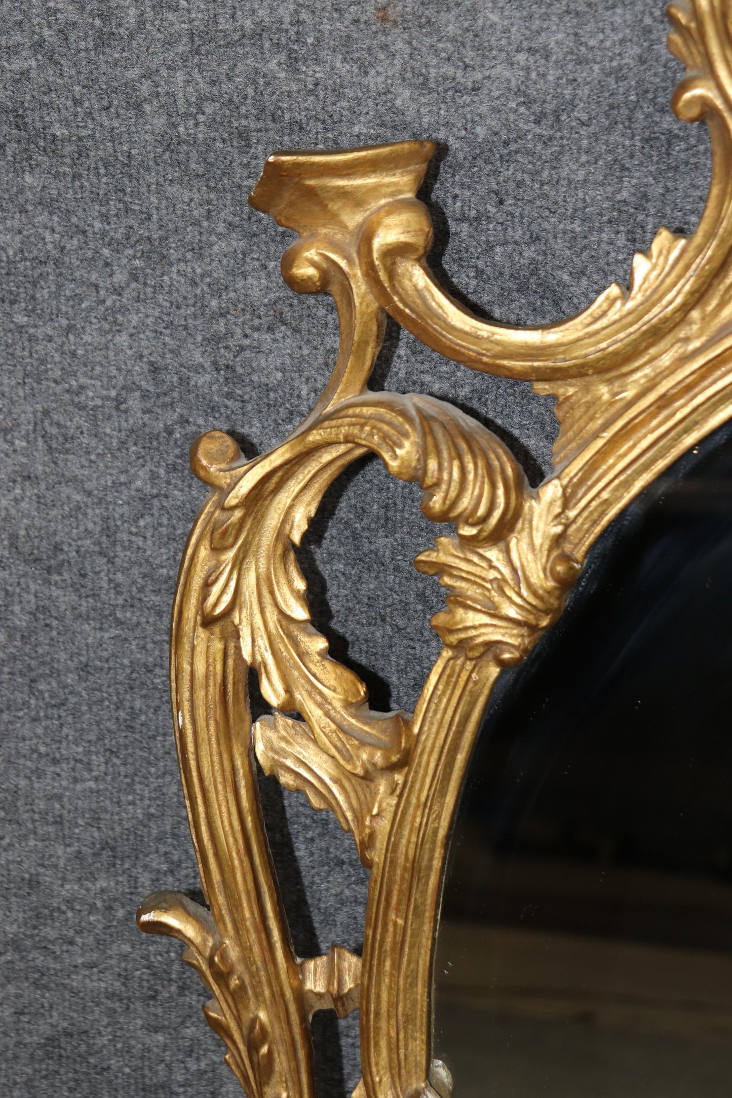 Fine Quality Carved Italian Giltwood Mirror with Shell Motif Atop.