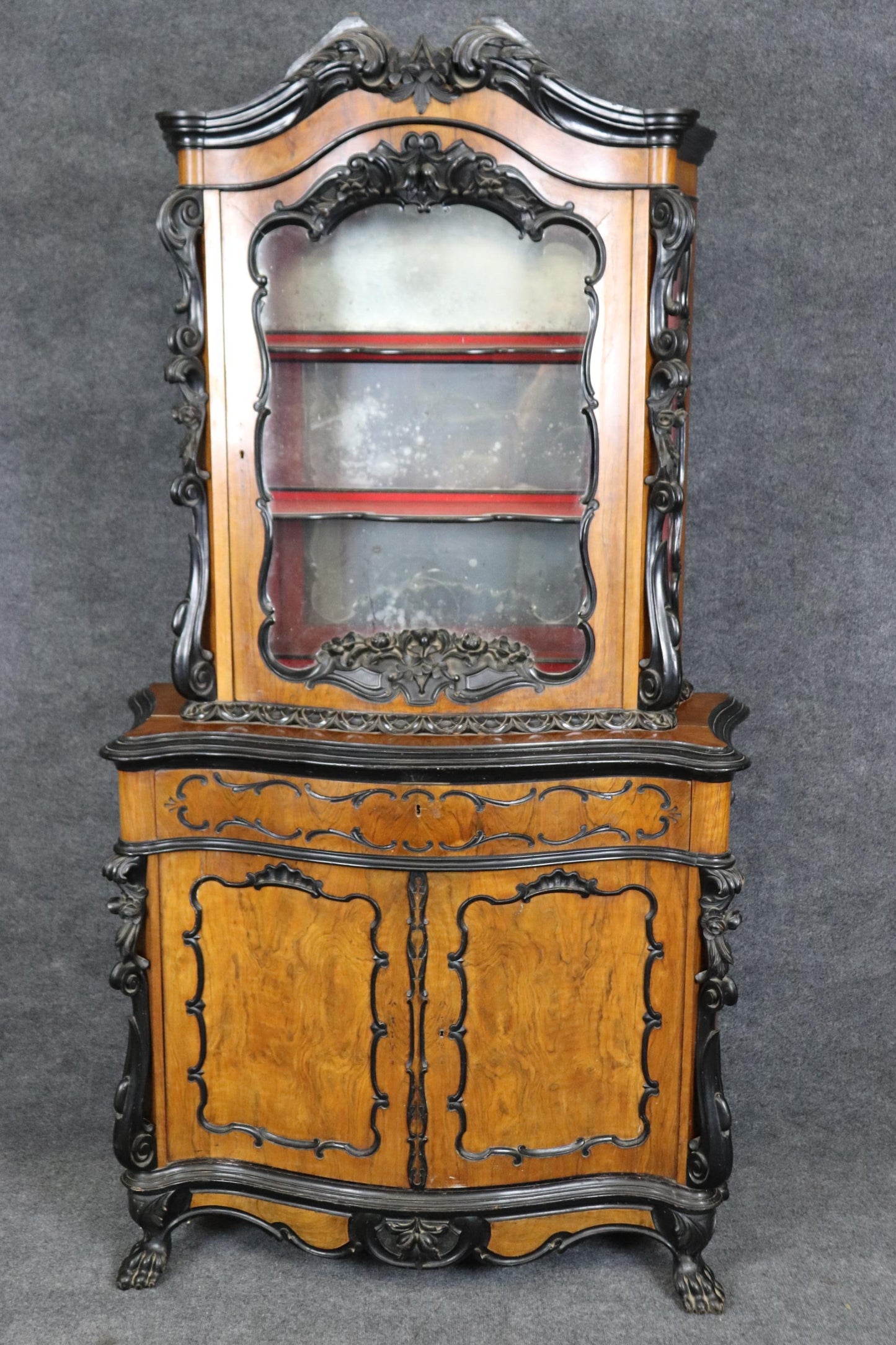 Continental European Ebonized Circassian Walnut Rococo Vitrine China Cabinet