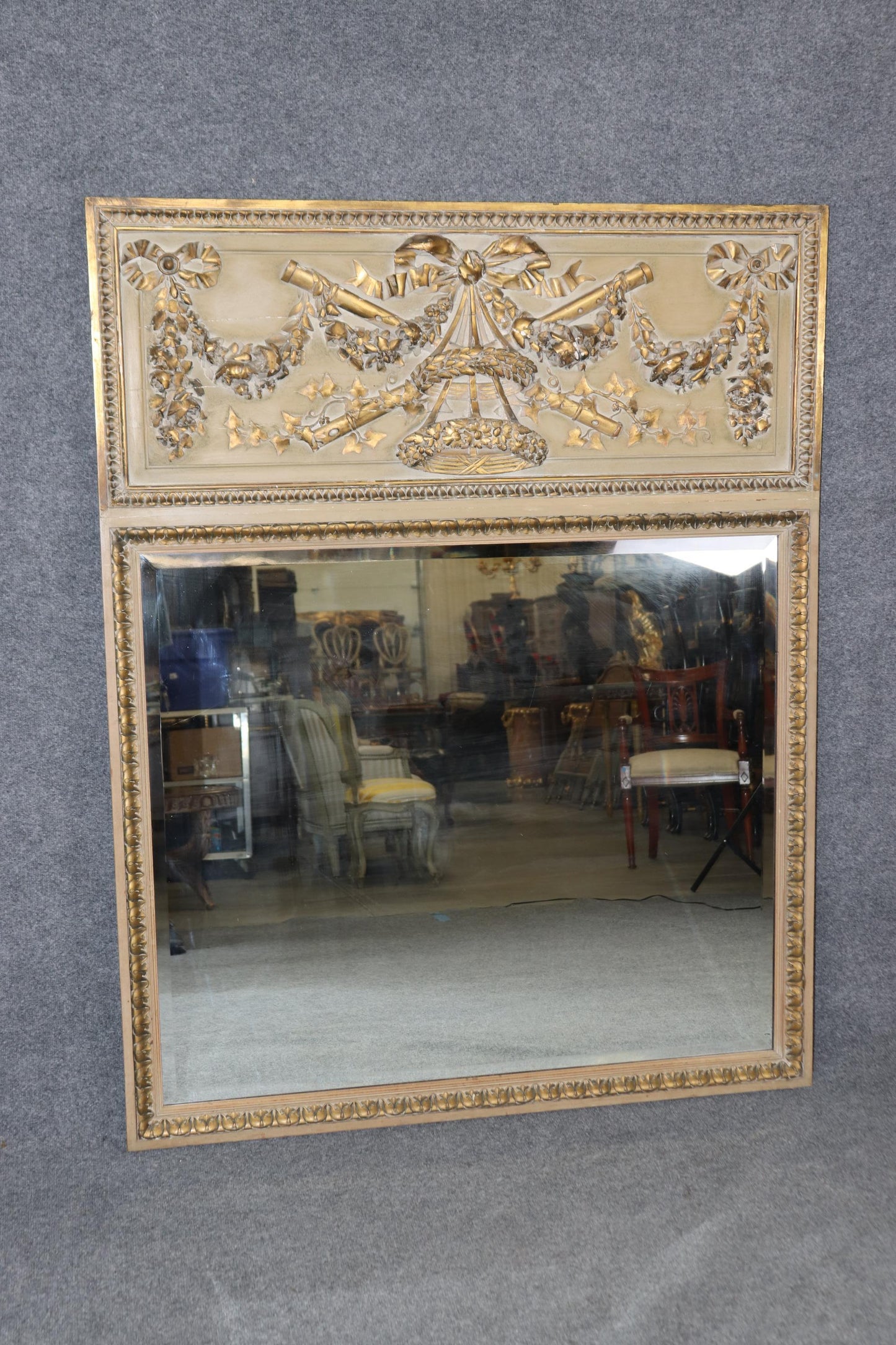 Finely Carved Paint Decorated and Giltwood Floral Beveled Glass Trumeau Mirror