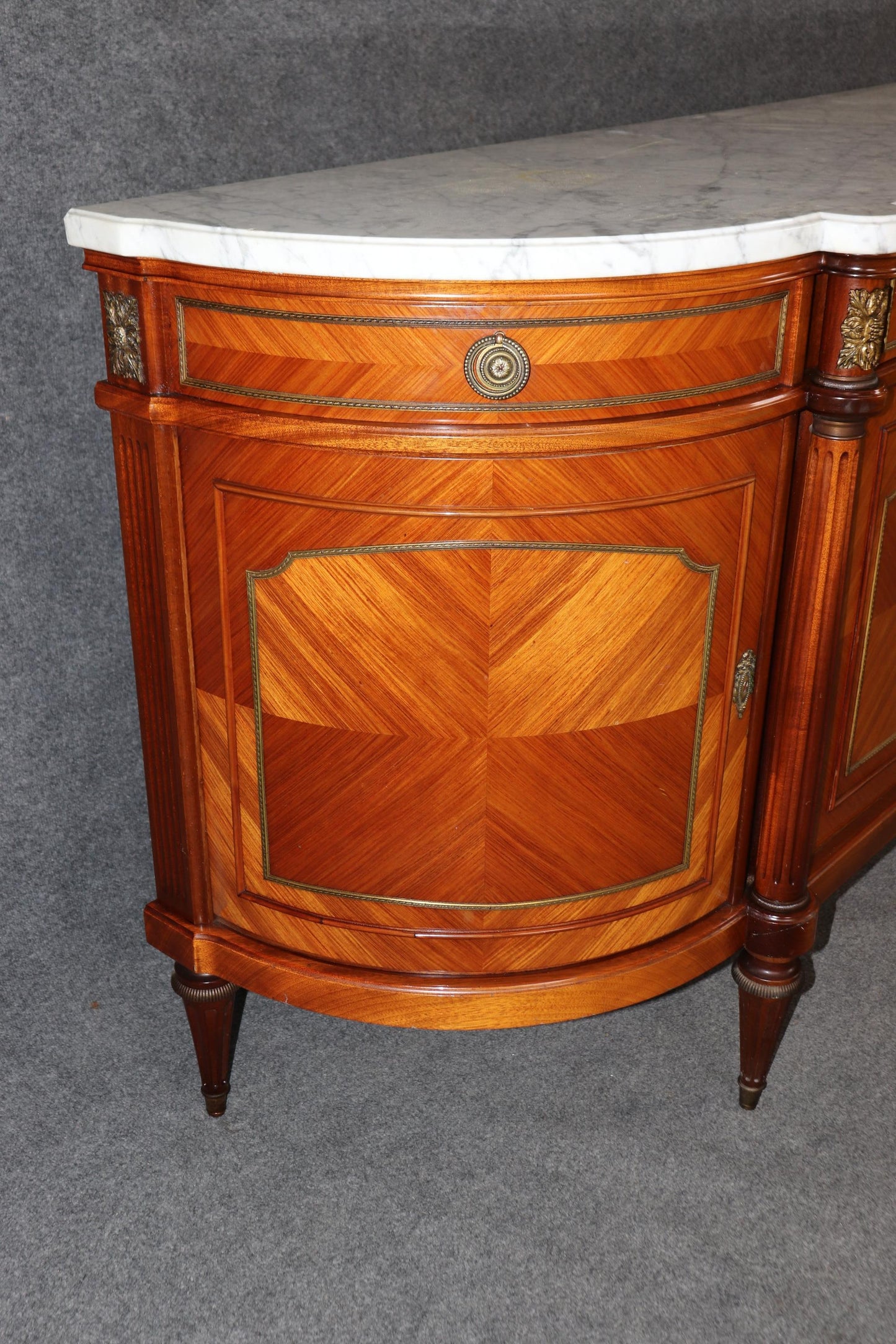 Grand French Louis XVI Kingwood Brass trimmed Demilune Marble Top Sideboard