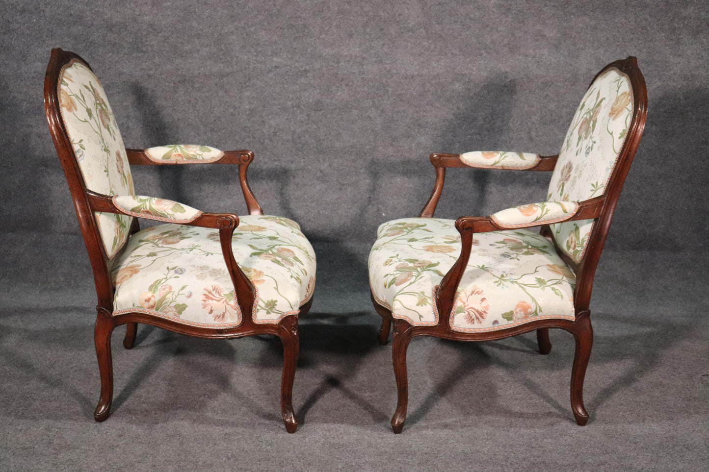 Fine Pair of French Louis XV Walnut Upholstered Open Bergère Open Armchairs