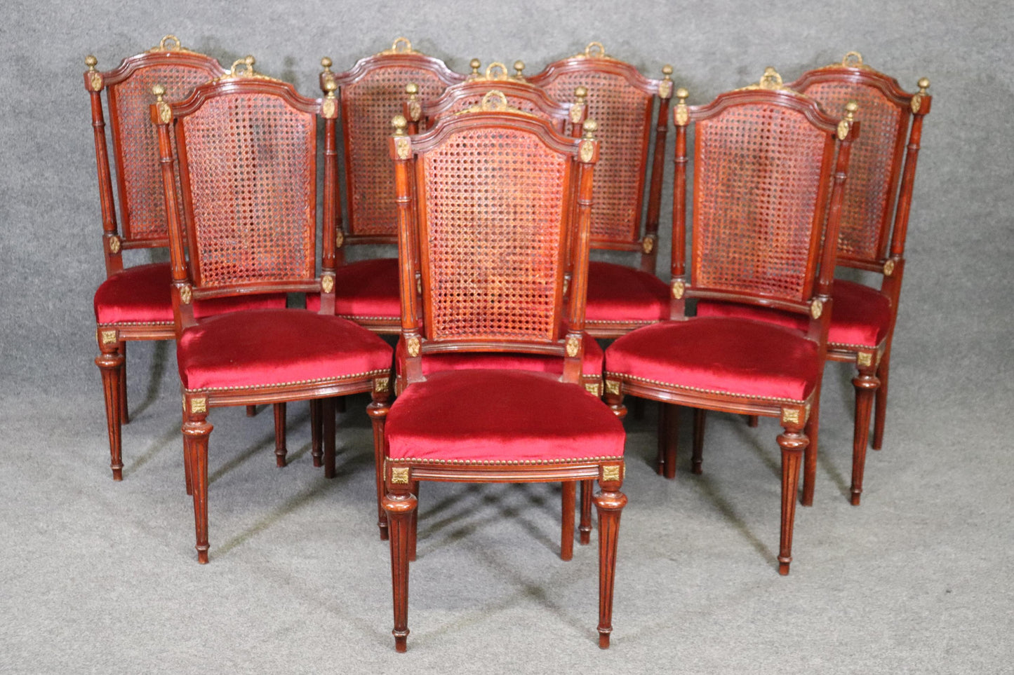 Set of 8 French Louis XVI Style Mahogany Cane Back Dining Chairs with Ormolu