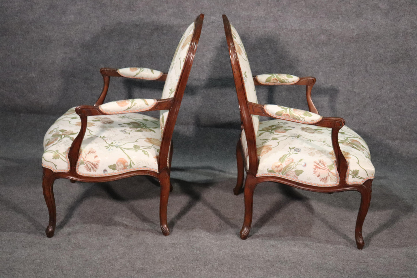 Fine Pair of French Louis XV Walnut Upholstered Open Bergère Open Armchairs