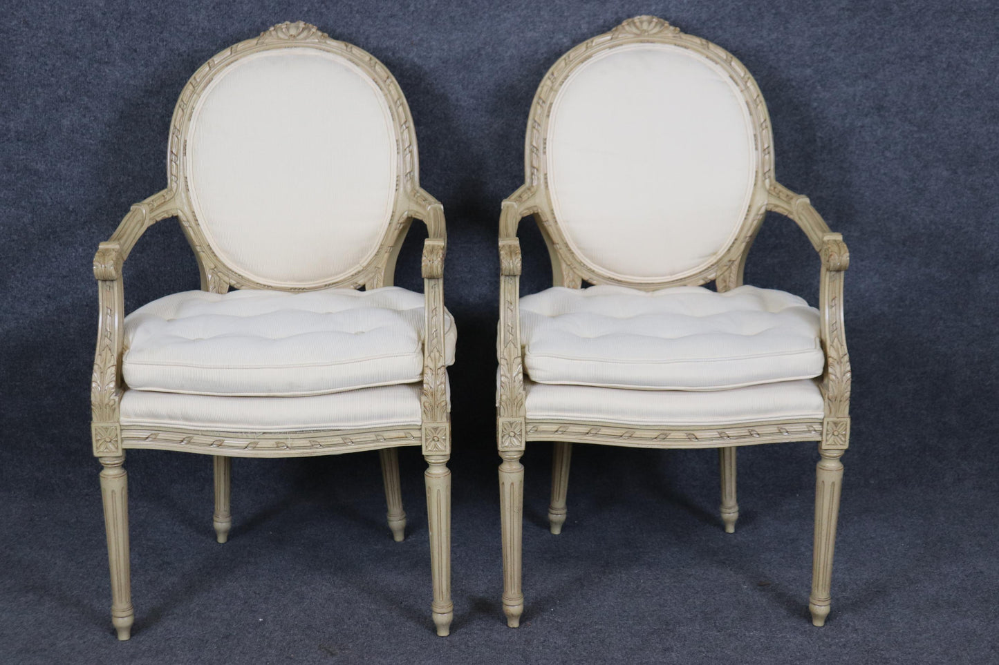 Fantastic Pair Distressed Creme Painted Hand-Carved French Louis XVI Armchairs