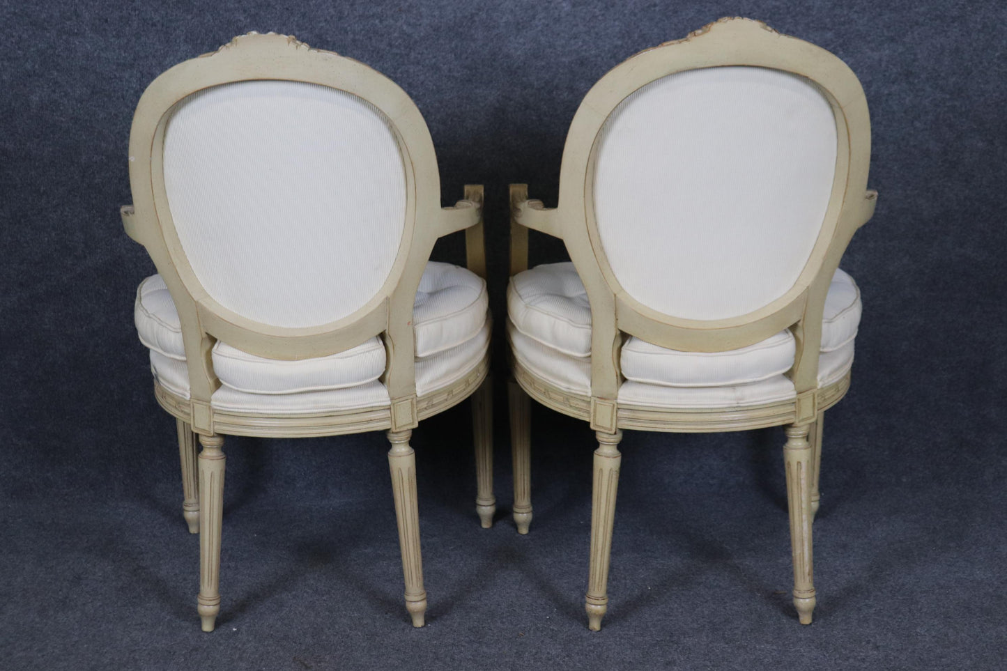 Fantastic Pair Distressed Creme Painted Hand-Carved French Louis XVI Armchairs